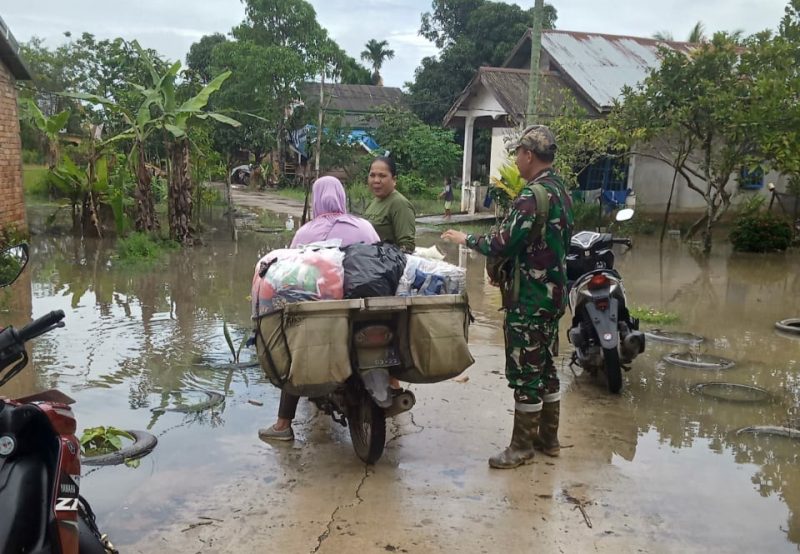 Satgas TMMD Imbau Warga Agar Berhati Hati Lintasi Genangan Banjir