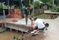 Satgas TMMD Kerjakan Pelebaran Jalan Masjid Nurul Iman