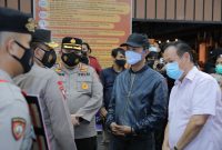 Walikota Palembang H Harnojoyo memberikan sosialisasi di Palembang Trade Center (PTC), Jalan R. Sukamto Kelurahan 8 Ilir, Kecamatan Ilir Timur Dua, Kamis Malam, 7 Juli 2021.