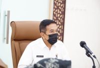 Plh Sekretaris Daerah (Sekda) Sumsel, H Akhmad Najib SH MHum menghadiri Rapat Koordinasi Nasional Unit Kerja Pengadaan Barang dan Jasa (Rakornas UKPBJ) Pemerintah Provinsi tahun 2021 secara virtual di Commad Center Kantor Gubernur, Rabu (25/8).
