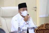 Rapat Penentuan Pelaksanaan Pembelajaran Tatap Muka (PTM) Terbatas Satuan Pendidikan SD dan SMP dalam Kabupaten Muba, yang dipimpin Bupati Musi Banyuasin Dr H Dodi Reza Alex Noerdin diwakili Sekretaris Daerah Kabupaten Muba Drs H Apriyadi MSi bersama Satgas COVID-19 Kabupaten Muba, Perangkat Daerah Terkait, dan para camat yang mengikuti secara virtual, di Ruang Rapat Serasan Sekate Sekretariat Daerah Muba, Rabu (18/8/2021).