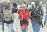 Satuan Tugas (Satgas) Operasi Nemangkawi menangkap Kelompok Kriminal Bersenjata (KKB), Jayapura, Papua, Gigen Telenggeng. 