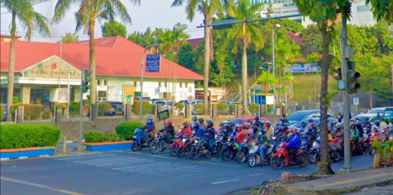 Ilustrasi lalu lintas di simpang Charitas Palembang