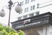 Kantor Otoritas Jasa Keuangan di Jakarta Pusat (photo:mglenak)