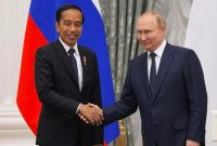 Presiden Rusia Vladimir Putin saat bersalaman dengan Presiden RI Joko Widodo