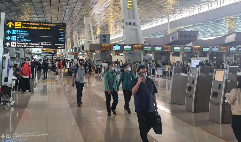 Suasana di Terminal 3 Bandara Soekarno Hatta, Senin (19/12/2022) jelang libur Nataru mengalami peningkatan jumlah penumpang