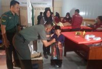 Kodim 0430/Banyuasin menggelar aksi bakti sosial, donor darah dan sunatan massal serta doa bersama di Aula Makodim setempat, Rabu [14/12/2022].