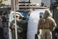 Polisi menemukan sebuah van putih yang diduga milik pelaku penembakan Imlek di Los Angeles (Dok: AP Photo/Damian Dovarganes)