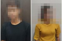 Pasutri pelaku pelecehan seksual terhadap anak saat diamankan polisi