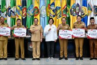 Menkeu dalam acara Penyerahan Insentif Fiskal dalam Pengendalian Inflasi Daerah di Gedung Sasana Bhakti Praja, Kementerian Dalam Negeri, Senin (31/07).