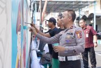 Korlantas Polri menggelar lomba mural dengan tema Modernisasi Pelayanan Polantas Presisi Mengawal Pemilu Damai Untuk Indonesia Maju