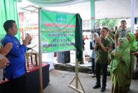 PJ Walikota Palembang H Ratu Dewa meresmikan Kampung Binaan PW Muslimat Nahdhatul Ulama di 3-4 Ulu Palembang