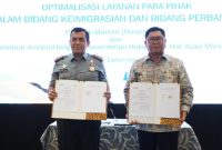 Direktur Jenderal Imigrasi, Silmy Karim pada acara penandatanganan PKS bersama Direktur Utama Bank Mandiri, Darmawan Junaidi