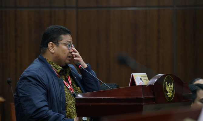 Ketua Bawaslu Rahmat Bagja saat memberikan keterangan dalam materi permohonan Nomor 166/PUU-XII/2023 di ruang sidang Mahkamah Konstitusi (MK), Jakarta, Selasa (6/2/2024)