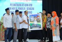 Penjabat Walikota Ratu Dewa Lantik Ratusan RT RW di Kecamatan Ilir Timur 1.