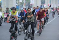 Gowes sepeda santai ribuan ASN [aparatur sipil negara] bersama masyarakat dalam semarak Hari Jadi Kota Palembang ke 1341 tahun 2024.