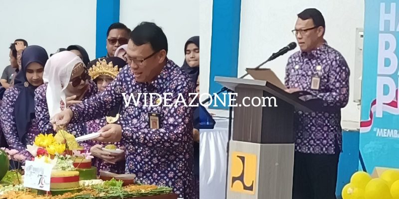 Semarak Hari Bakti PU 2024, tampak Kadis PUPR Ahmad Bastari memotong tumpeng bersama jajaran di Dinas PUPR Kota Palembang, Selasa 3 Desember 2024.