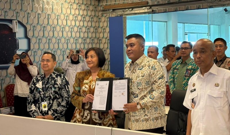 Pemkot Palembang bersama Dorektorat Jenderal Pajak [DJP] membubuhkan tandatangan kesepakatan PKS.