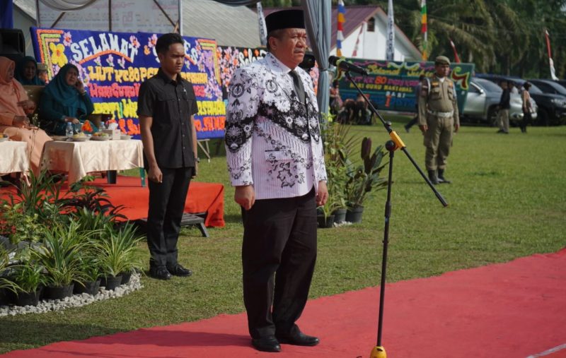 Bupati Asahan Taifik Zainal Abidin dalam peringatan Hari Guru Nasional [HGN] 2025 dan HUT PGRI ke-80 di Lapangan PTPN IV Kebun Sei Dadap tahun ini mengusung tema “Guru Bermutu, Indonesia Maju – Bersama PGRI Wujudkan Indonesia Emas.”