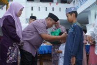 Santunan anak yatim dan buka puasa bersama digelar di halaman Dinas Kesehatan Kabupaten Asahan, Jumat 13 Maret 2026.