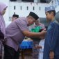 Santunan anak yatim dan buka puasa bersama digelar di halaman Dinas Kesehatan Kabupaten Asahan, Jumat 13 Maret 2026.