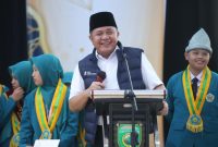 Gubernur Sumsel Dr Herman Deru saat menghadiri Haflah Milad ke-76 dan Wisuda Kelas Pondok Pesantren Raudhatul Ulum Salatiga Tahun Ajaran 2025/2026 di Gedung Olahraga dan Serbaguna Kampus A Pondok Pesantren Raudhatul Ulum Sakatiga Indralaya, Kamis 21 Mei 2026.