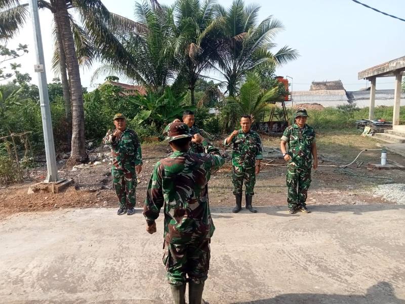 Apel pagi yang digelar sebelum personel turun ke lokasi pekerjaan, Minggu 9 Agustus 2026. Apel menjadi momentum untuk mengecek kesiapan sekaligus menyatukan langkah personel sebelum menjalankan tugas di sejumlah sasaran TMMD.