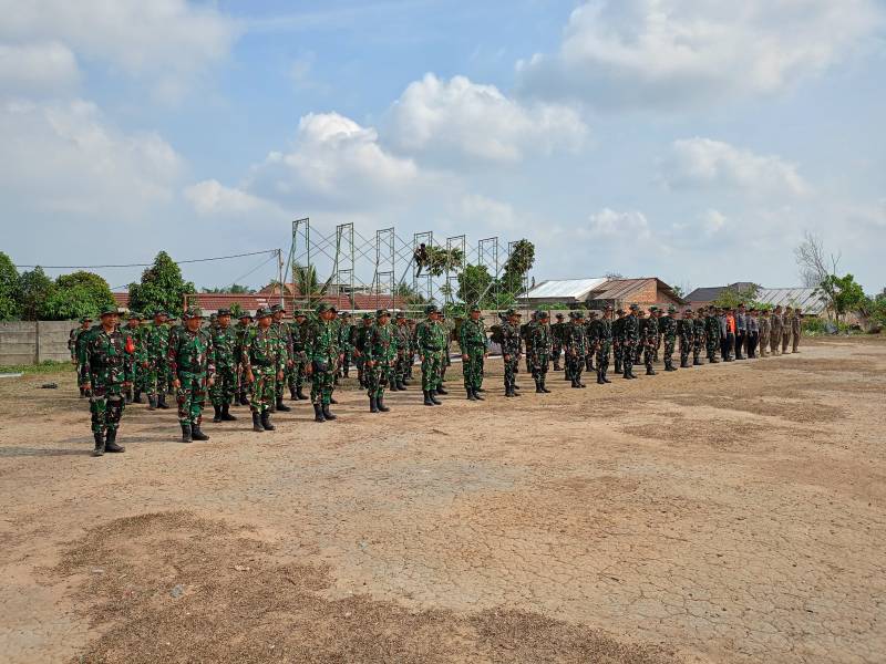 Satgas TMMD ke-129 Gelar Gladi Upacara Penutupan di Lapangan Sepak Bola kelurahan Talang Jambe