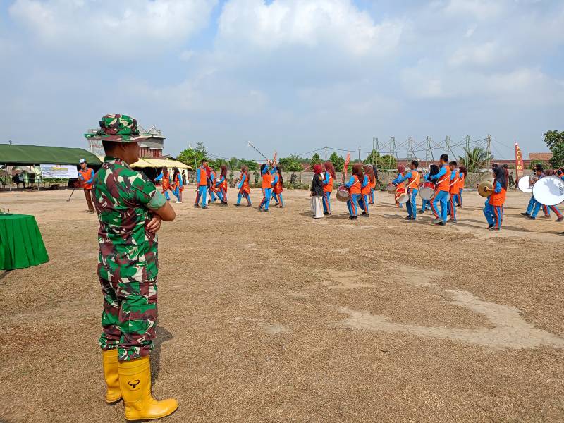 Wakil Komandan Satuan Tugas [Wadan Satgas] TMMD ke-129 Kodim 0418 Palembang, Letkol Inf Dery Septriandi ST MM MHan, menghadiri sekaligus mengecek langsung pelaksanaan gladi upacara penutupan TMMD ke-129 di lapangan sepak bola Kelurahan Talang Jambi, Kota Palembang, Rabu 12 Agustus 2026.
