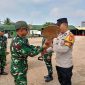 Menjelang pelaksanaan upacara penutupan TNI Manunggal Membangun Desa [TMMD] ke-129 Kodim 0418 Palembang, personel Satgas TMMD bersama jajaran Polri melaksanakan gladi upacara di lapangan sepak bola Kelurahan Talang Jambe, Kecamatan Sukarami, Kota Palembang, Rabu 12 Agustus 2026.