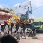 Lomba gerak jalan yang digelar di ruas Jalan Lintas Palembang-Jambi, Rabu 12 Agustus  2026, menuai kekhawatiran masyarakat. Bagaimana tidak, peserta harus beraktivitas di jalur yang masih dilalui kendaraan, termasuk truk-truk besar. [Foto: Desi OY/WI]