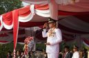 Bupati OKU Timur, Ir H Lanosin MT MM bertindak sebagai Inspektur Upacara HUT RI ke-81 Halaman Perkantoran Pemerintah Kabupaten OKU Timur, Senin, 17 Agustus 2026.